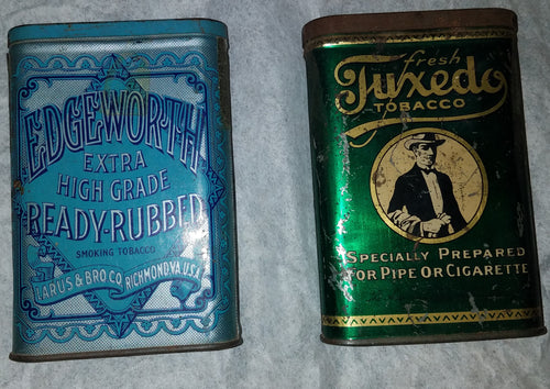 A PAIR OF VINTAGE TOBACCO TINS